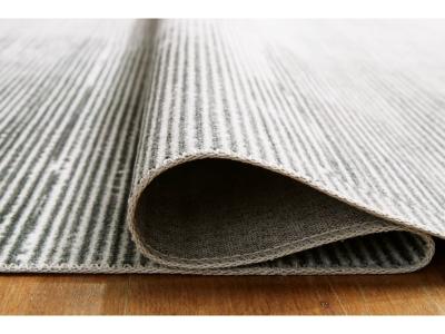 Signature Design by Ashley Milset 8'1" x 10' Washable Rug - R406251